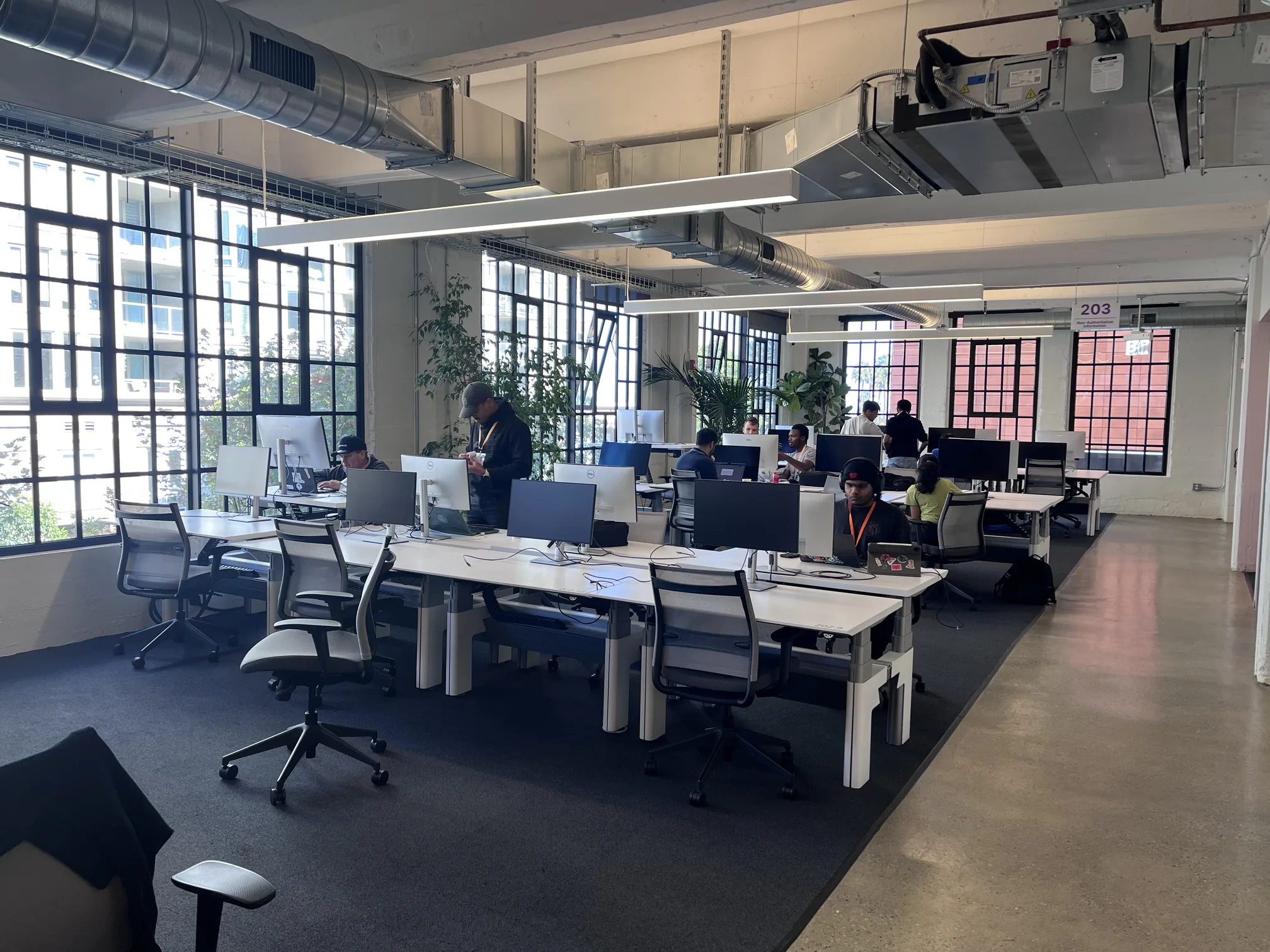 Teams hacking across the open floor at Cloudflare HQ